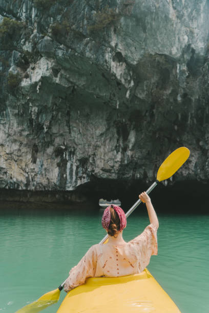 istock Woman kayaking in Halong Bay 954124856
