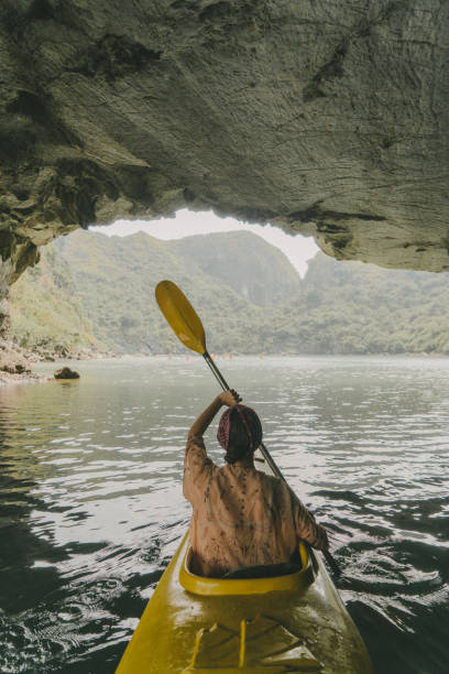 istock Woman kayaking in Halong Bay 954124858