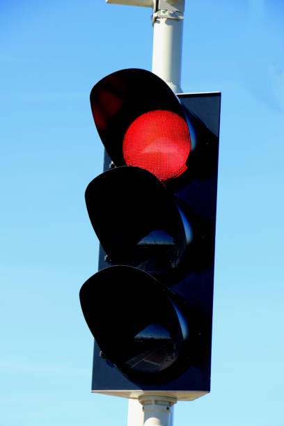 istock Traffic lights in a clear blue sky 954125194