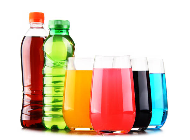istock Glasses and bottles of assorted carbonated soft drinks 954130026