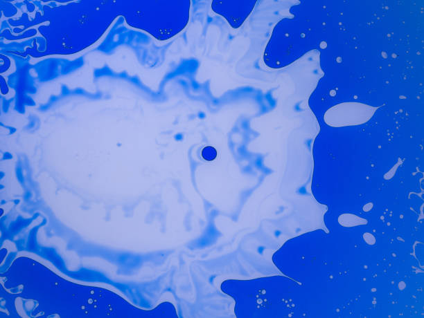 istock The abstract background with paints on a glass 954130720