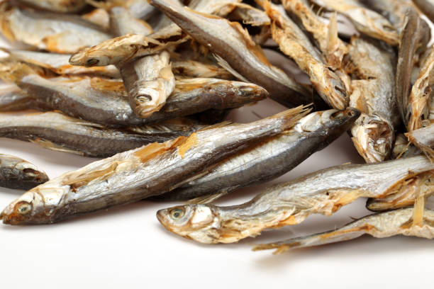 istock Dried fishes isolated on white background 954139150