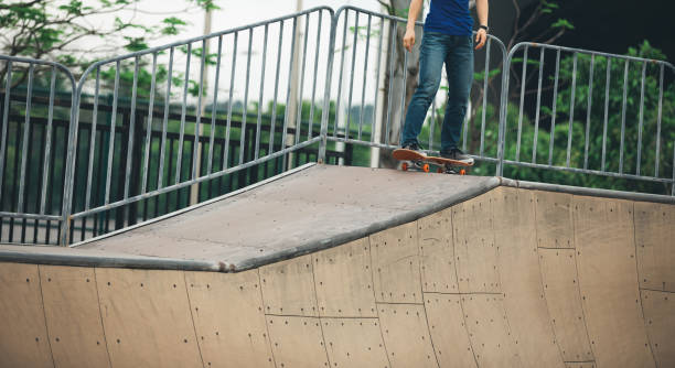 istock Skateboarder on skatepark ramp 954140818