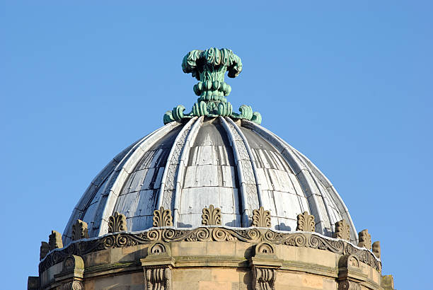 Weather vane and wind direction compass, on one of the domes at the Old royal Naval College at Greenwich, UK.
