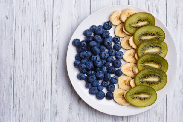 Fruit Plate Blueberries Banana And Kiwi Slices On A Plate