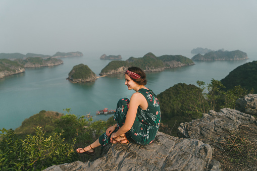 Young Caucasian woman looking at scenic view of Halong Bay