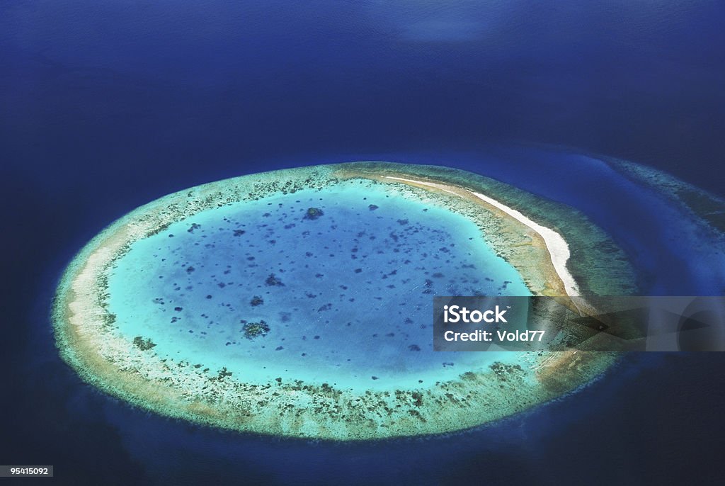 Desert Island in the ocean  Atoll Stock Photo
