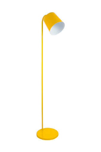 Lámpara de pie amarillo aislada sobre fondo blanco photo