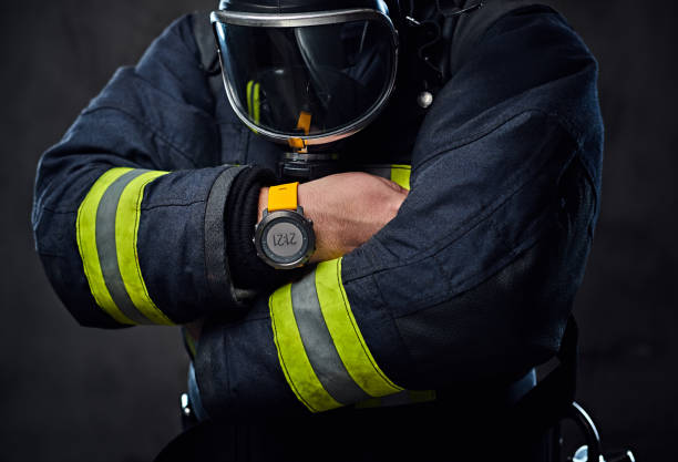 istock Studio portrait of a male dressed in a firefighter uniform. 954160136