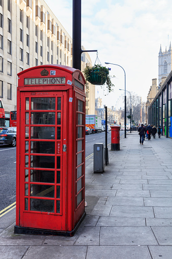 London, England - February 21, 2018: London's cultural icons don't get much more quintessential than the red telephone box.