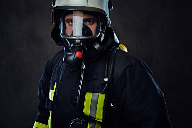 istock Firefighter dressed in uniform and an oxygen mask. 954160560