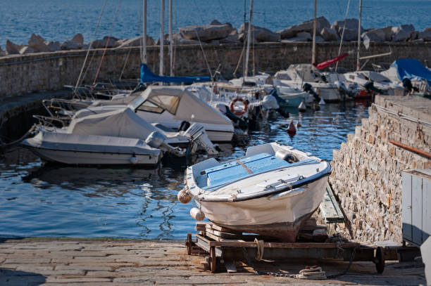 istock Boat on cart for maintenance in harbor. 954160604