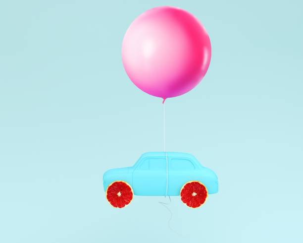 istock Grapefruit layout wheel and car blue with pink balloon floating on pastel blue background. minimal idea food and fruit concept. Idea creative to advertising marketing communications. 954166414