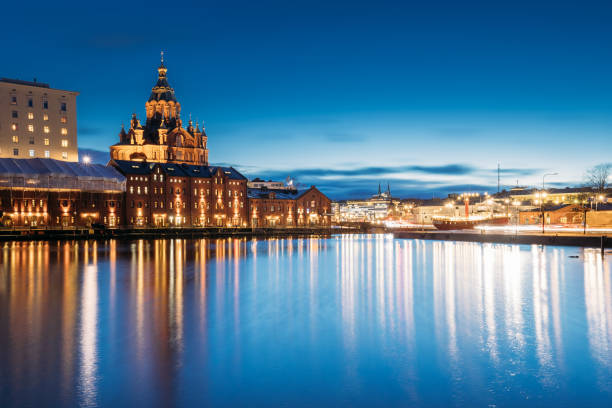 istock Reflection Of Illuminated Buildings In City At Night 954166816