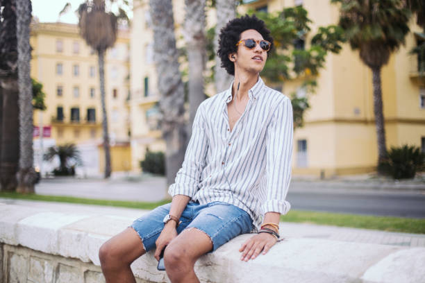 istock Man sitting outdoors 954167942