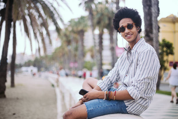 istock Tourist man listening music 954168770