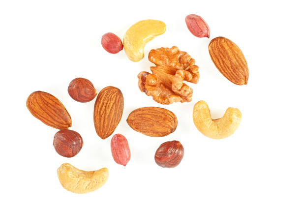 istock Mix of different nuts isolated on a white background 954169320