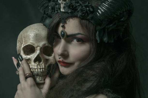 istock Horned asian girl with skull 954171690