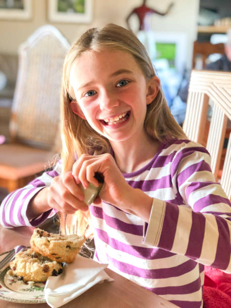 istock Little Girl Enjoying her Breakfast 954180680