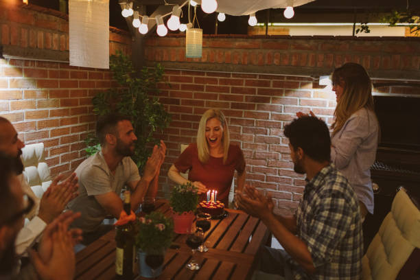 istock Happy Friends Having Birthday Party 954191484