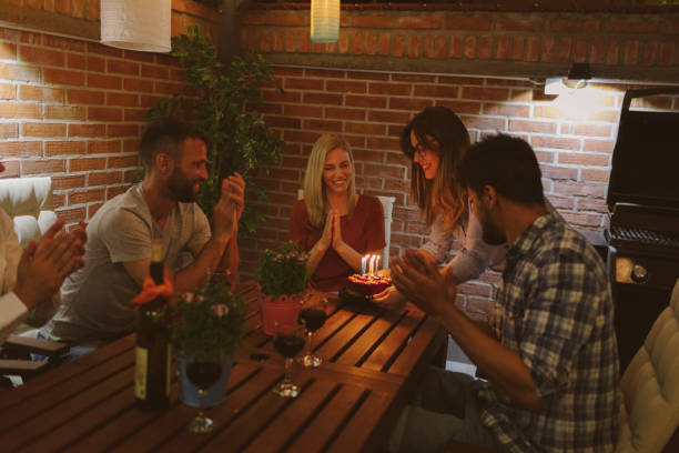istock Happy Friends Having Birthday Party 954191618