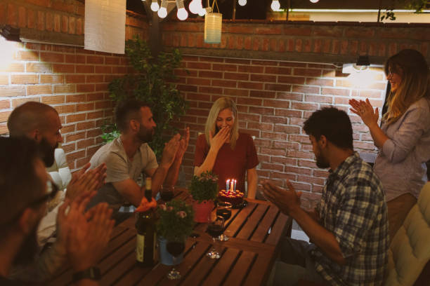 istock Happy Friends Having Birthday Party 954192252