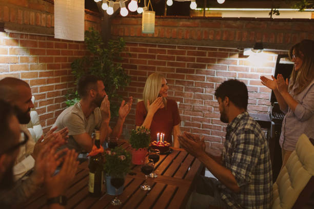 istock Happy Friends Having Birthday Party 954192610