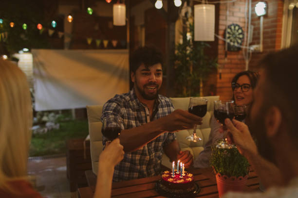 istock Happy Friends Having Birthday Party 954195516