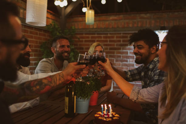 istock Happy Friends Having Birthday Party 954195808