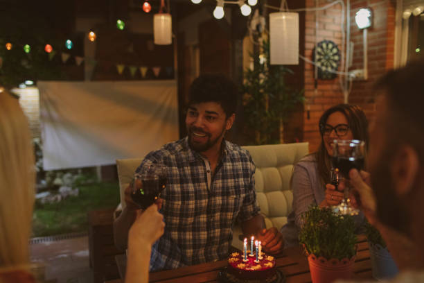 istock Happy Friends Having Birthday Party 954196142
