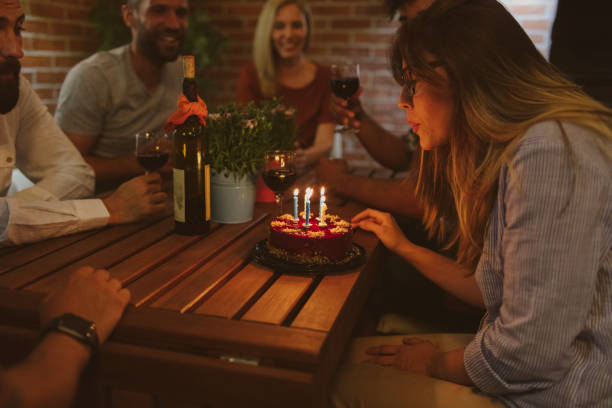 istock Happy Friends Having Birthday Party 954196216