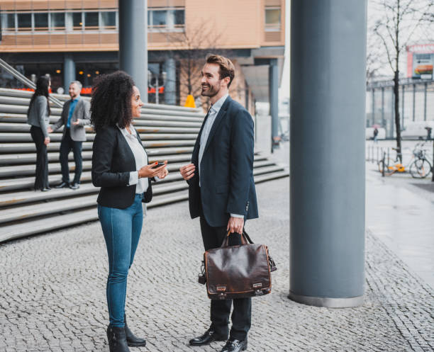 istock Businesspeople talking outdoors 954204142