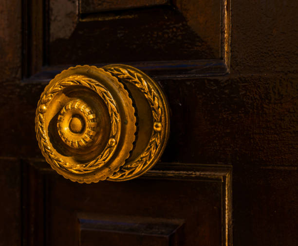 istock close up on a round door handle with decorative elements, door decoration 954215038
