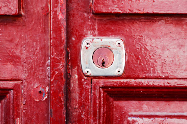 istock old door lock, aged metal door, home security 954216264