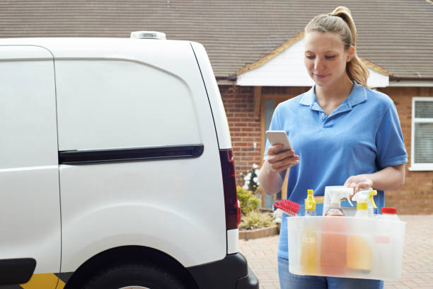 istock Woman Running Mobile Cleaning Business Checking Text Messages 954220032