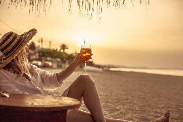 istock Young caucasian woman enjoying at the beach 954220632