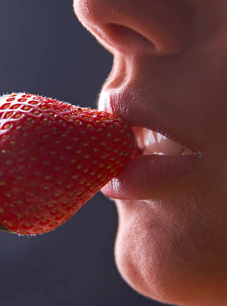 lips and strawbewrry stock photo