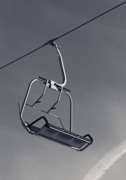 istock Chair lift at ski resort 954225260