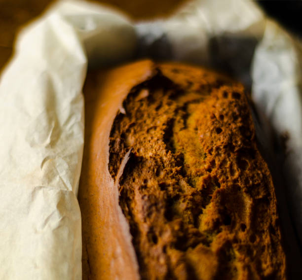 Freshly baked banana cake with nuts, banana bread in baking form