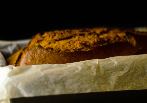 Freshly baked banana cake with nuts, banana bread in baking form