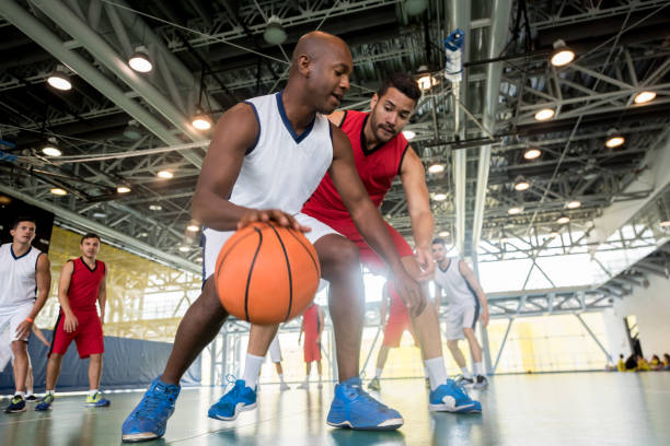 istock Young basketball players at a game 954226790