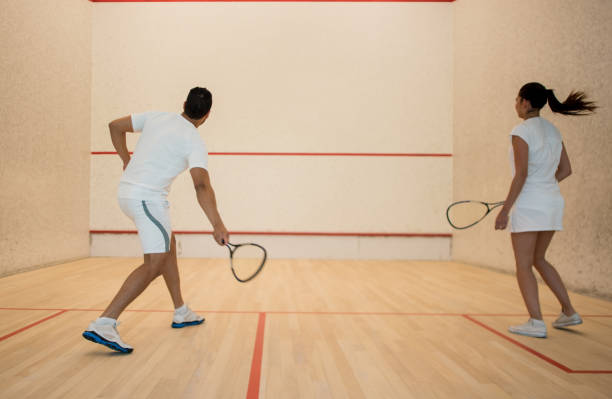 istock Couple playing squash at the club 954226800