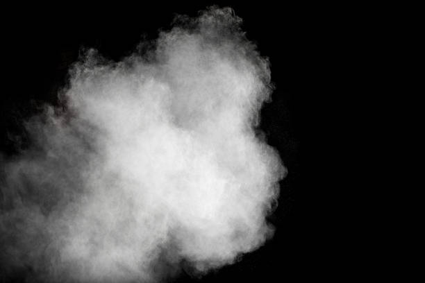 istock Launched white powder splash on black background. Bizarre forms of of white powder explosion cloud against dark background. 954235992