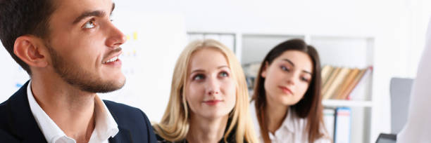 istock Group of people hold silver pen ready to make 954240770