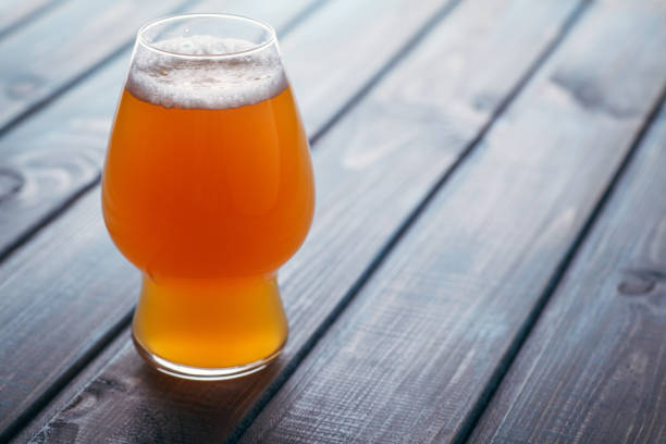 istock Pale ale on blue wood 954241094