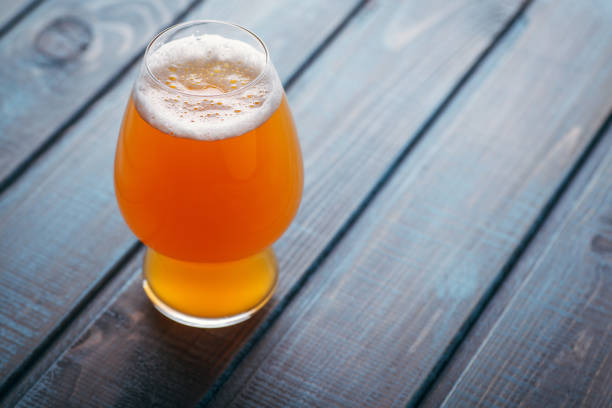 istock Pale ale on blue wood 954241162