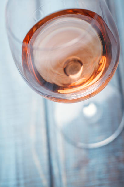 istock Rose wine on blue wood 954241272