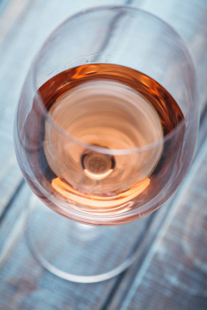istock Rose wine on blue wood 954241344