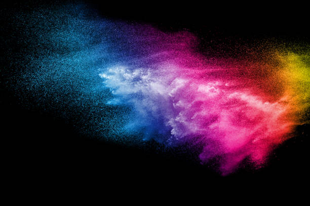 istock Multi color powder explosion isolated on black background. Colored dust splash cloud on black background. Launched colorful particles on background. Painted Holi. 954248602