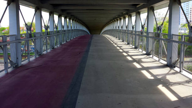 istock Pedestrian and bicycle footbridge 954260910